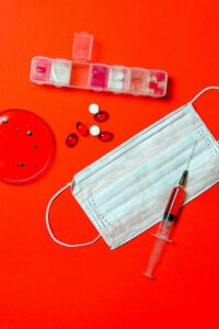 Syringe and Pills with Petri Dish