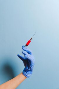 Nurse Holding Syringe