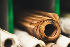 Stack of paper rolls in shelf